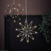 matches21 - Webshop LED Sterne Winterbeleuchtung haengend Fensterdeko Stern Glitzer Metall 1 Stk 30 cm in 2 Farben 122757 4 1 19